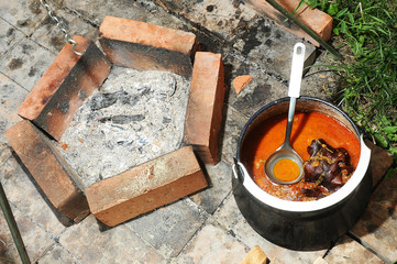 Outdore dish preparation beans pot