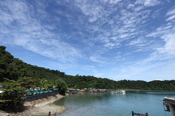 Fototapeta na wymiar Ferry Carry car vehicles acroos Thai Bay to Koh Chang Island in beautiful sunshine day