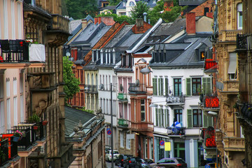 Residential buildings along the street in Wiesbaden city center, Hesse, Germany. - obrazy, fototapety, plakaty