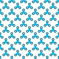 Background from blue children fidget spinners on white background. Playing backdrop of hand twisting toys with bearings in a row next to each other and alternately under him 