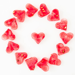 Water melon cut into heart shape. Flat lay round composition on white background. love concept. Valentine's Day Concept