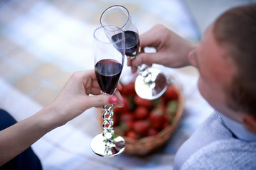 man and girl drinking wine