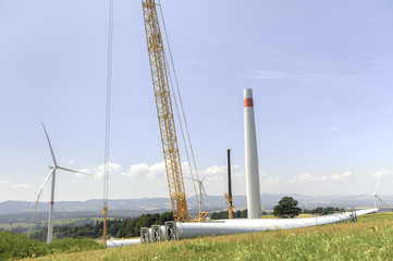 Building and assembling a construction windmill by a crane
