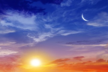 Ramadan background . Red sunset and moon . Mubarak background . Against the background of clouds . beautiful sky .