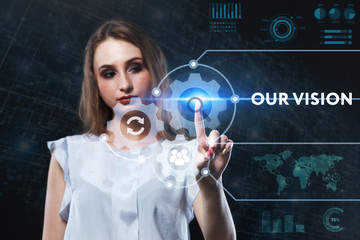The concept of business, technology, the Internet and the network. A young entrepreneur working on a virtual screen of the future and sees the inscription: Our vision