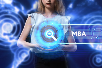 The concept of business, technology, the Internet and the network. A young entrepreneur working on a virtual screen of the future and sees the inscription: MBA