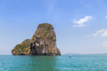 Naklejka premium Small limestone island in andaman sea at Railay beach krabi Thailand