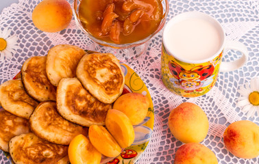 pancakes with apricot jam and milk