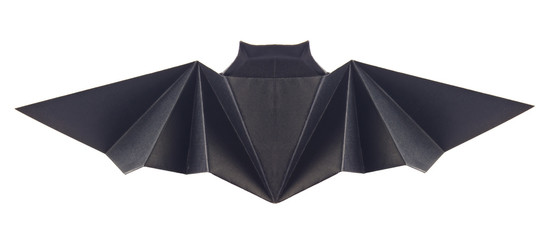 Black bat of origami, isolated on white background. Stock photo.