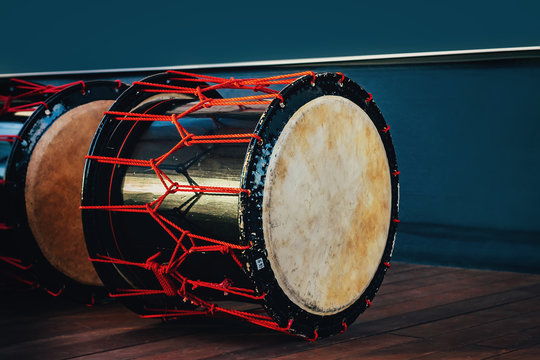Taiko drums o-kedo on scene background. Musical instrument of Asia