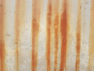 red rust leaks on concrete wall texture