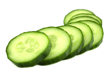 Fresh cucumber slices isolated on white background.