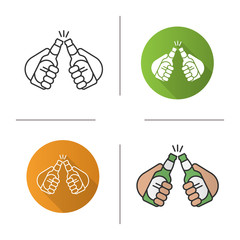 Toasting beer bottles in hands icon