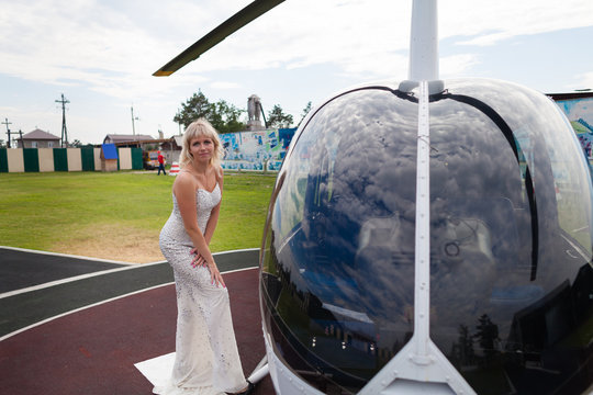 Helicopter and beautiful girl