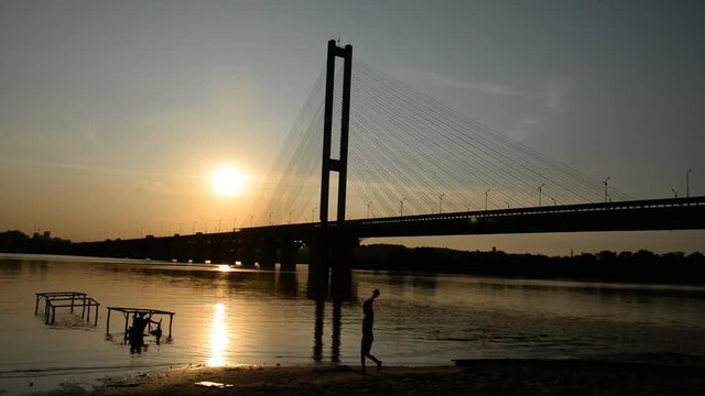 River and bridge.Most at sunset
