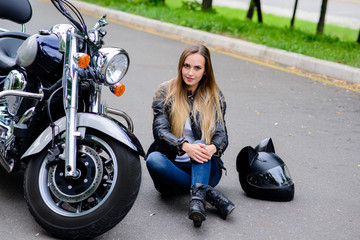 Plakat Beautiful girl on a motorcycle.