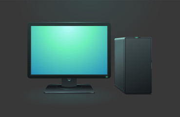 Black computer with monitor on dark background