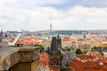 Panorama of Prague view of Charles bridge, on the bridge a crowd of people