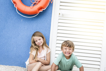 Beautiful girl and boy on the beach