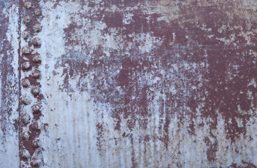 Old riveted rusty metal background