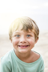 Pretty blond boy at the beach
