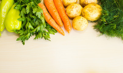 Fresh vegetables on white wood background. Layout for menu or recipe