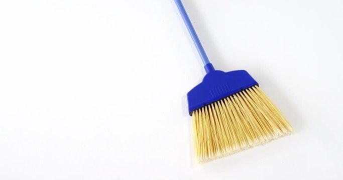 Broom with plastic handle