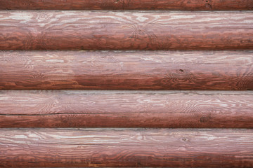 Obraz premium Wooden brown horizontal background of natural material with knots in different places