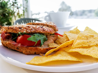 Sandwich with chicken, cheese and potatoes