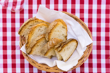 bread in basket - little roll breads in basket on table