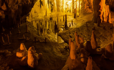 Formation of stalagmites and stalactites in the caves of Frasassi, Italy