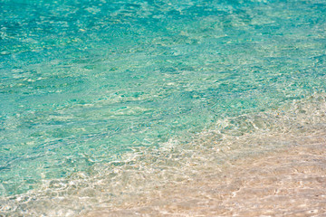 Azure water of the beach Playa Paradise of the island of Cayo Largo, Cuba. Сlose-up.