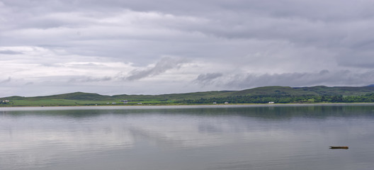 View from the village of Southend of the Mull of Kintyre, the headland at the most southwetern point of the Kintyre Peninsula in Argyll, Scotland, United Kingdom
