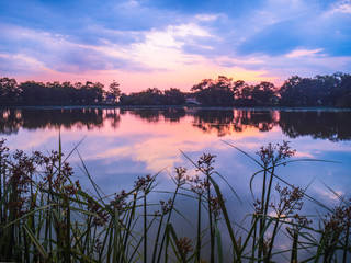 Sunset with reflect sky in the water.