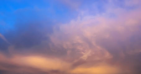 Dramatic atmosphere closeup view of sunset sky and cloud blur background.