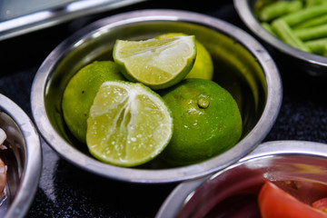 Lime is prepared for cooking.