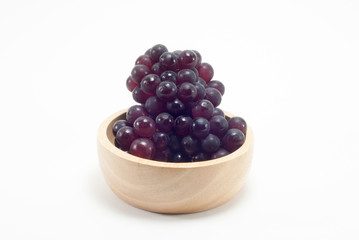 Grapes in a wooden cup