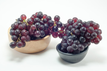Grapes in a wooden cup
