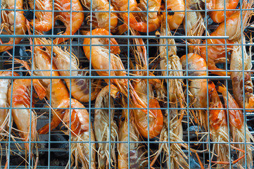 Top view to barbecue shrimps on grill