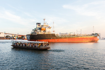 Fototapeta premium People on ferry boat across Chao Praya river.