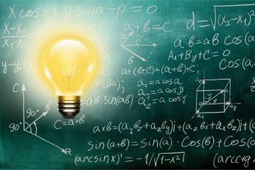 Light bulb on blackboard background.