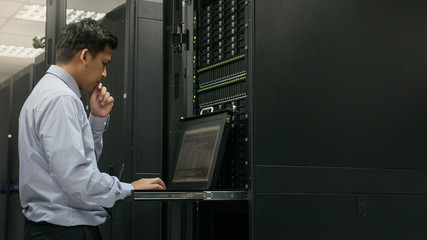 Administrator serious working with system in data center