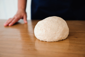 Chef preparing dough - cooking process