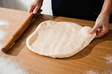 Chef preparing dough - cooking process