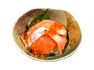 Isolaed salmon and salmon roe on rice.
