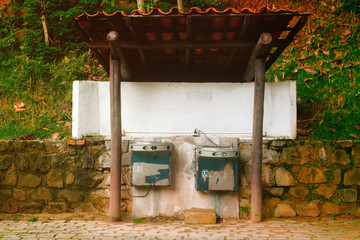 Two water fountains in a park