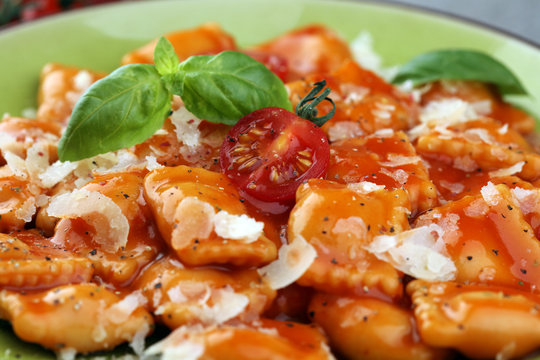 Ravioli with tomato sauce and basil