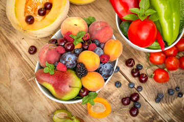 Naklejka na ściany i meble Healthy eating, healthy diet, eating fresh organic fruits and vegetables