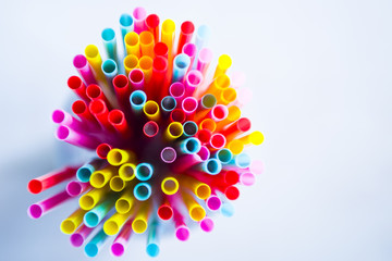 Colorful drinking straws as background