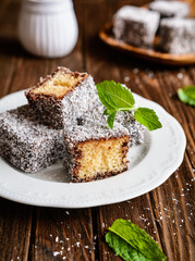 Lamington cakes with chocolate and coconut coating